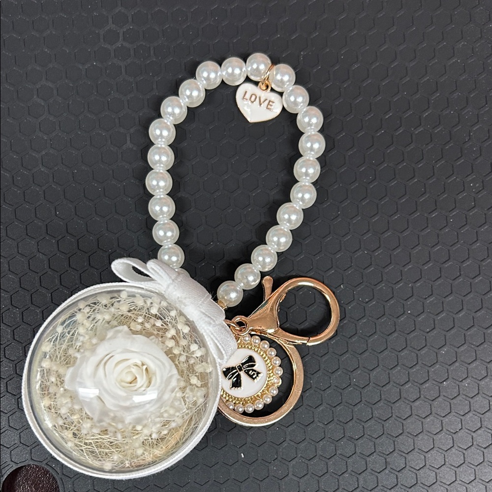 Elegant Pearl Bag Charm with Gold Accents